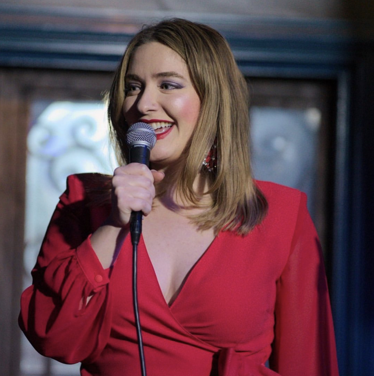 Lauren on stage laughing